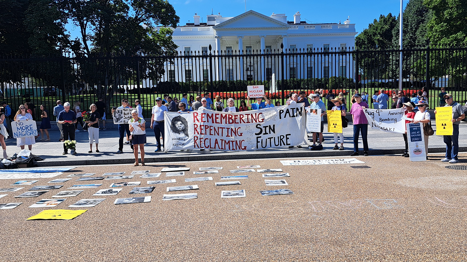 Faith groups mark atomic bombing anniversary with White House vigil and Pentagon arrests