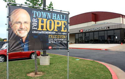 (RNS2-APR24) Sign outside Oklahoma City-area church advertises simulcast event featuring Christian financial expert Dave Ramsey. His events are popular amid the difficult economic times. For use with RNS-RAMSEY-ECON, transmitted April 24, 2009. Religion News Service photo by Erik Tryggestad. 