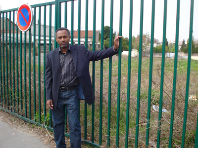 (RNS1-MAY14) Mohamed Abdoulbaki, the vice president of the Cultural Federation of Muslims of Montreuil, France, in front of the site of a planned mosque for the town's immigrant Muslims. Abdoulbaki and others had to overcome significant local opposition before the mosque could be built. For use with RNS-EUROPE-MOSQUES, transmitted May 14, 2009. Religion News Service photo by Elizabeth Bryant. 