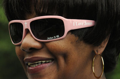 (RNS1-JUNE01) Donna Singleterry models Christian-themed sunglasses that were created and marketed by her husband, Gerome Singleterry, of Calera, Ala. For use with RNS-JESUS-GLASSES, transmitted June 1, 2009. Religion News Service photo by Beverly Taylor/The Birmingham News. 