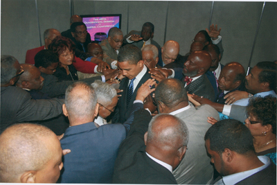Barack Obama, then a presidential candidate, is surrounded by bishops of the African Methodist Episcopal Church during the church's General Conference in July 2008 in St. Louis. Religion News Service file photo courtesy Jasmine McKenzie/African Methodist Episcopal Church. 