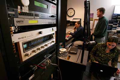 (RNS5-APRIL06) In the studio of New Jersey's WJUX, a new Christian radio station known as 
The Bridge, general manager Dennis Radeke (center) oversees operations with Kim McCarrick, the 
station's assistant general manager, and her brother Mike McCarrick, a production intern. See RNS-
CHRISTIAN-RADIO, transmitted April 6, 2004. Photo by Andrew Mills. 