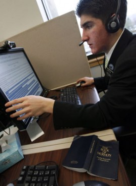 (RNS) Mormon missionary John Tagg of Spanish Fork, Utah, chats online with someone interested in learning more about the Church of Jesus Christ of Latter-day Saints. A group of Mormon missionaries answers questions at mormon.org through interactive chats, e-mails and on the phone. RNS file photo by Francisco Kjolseth/The Salt Lake Tribune. 
