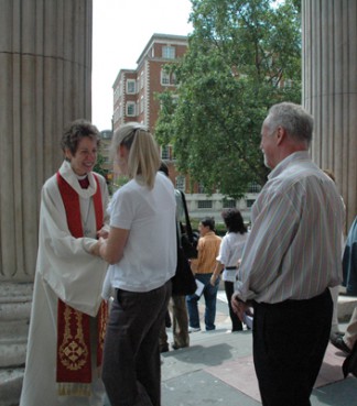 Episcopal Presiding Bishop Katharine Jefferts Schori greets worshippers outside St. Paul's Cathedral in London. The presiding bishop defended her church's embrace of gays and lesbians during a whirlwind tour of six English-speaking Anglican provinces in 2010. 