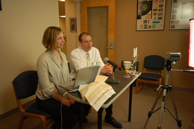 (RNS2-SEPT1) Rabbis Laura A. Baum and Robert B. Barr of Congregation Beth Adam in Cincinnati, Ohio, broadcast worship services via their website http://www.OurJewishCommunity.org, for Jews who cannot make it to the synagogue, or who balk at sometimes high admission prices. For use with RNS-JEWS-COST, transmitted Sept. 1, 2010. Religion News Service photo by Alan Brown and courtesy of Congregation Beth Adam. 