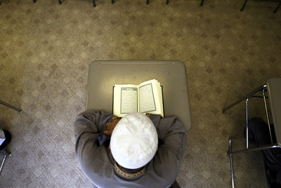 (RNS) Muhammad Salem studies the Quran at An-Noor Academy in Piscataway, N.J. Religion News Service file photo by Ed Murray/The Star-Ledger. 