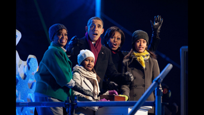 (RNS1-DEC14) President Obama, with mother-in-law Marian Robinson, daughters Sasha and Malia, and first lady Michelle Obama light the National Christmas Tree during a ceremony on the Ellipse in Washington, D.C., Dec. 9, 2010. For use with RNS-OBAMA-CHRISTIAN, transmitted Dec. 14, 2010. RNS photo courtesy Chuck Kennedy/The White House. 