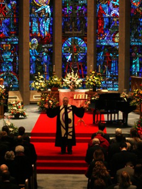 (RNS1-JAN26) The  Rev. David A. Holyan, a volunteer with Presbyterian Disaster Assistance, gives the benediction at a 2008 memorial service for Kenneth Yost, who was among 6 people killed in a shooting at the Kirkwood (Mo.) City Council meeting. For use with RNS-DISASTER-RELIEF, transmitted Jan. 26, 2011. RNS photo by Laurie Skrivan/The St. Louis Post-Dispatch. 