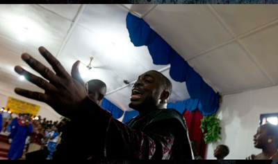 (RNS6-JAN18) `The Redemption of General Butt Naked'' centers on a former Liberian warlord who's responsible for the murder of thousands as he seeks salvation and forgiveness as an evangelical preacher. For use with RNS-SUNDANCE-FAITH, transmitted Jan. 18, 2011. RNS photo 