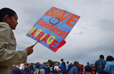 (RNS) Samara Mendoza of Germantown, Md., holds a sign during the ``Mayday for Marriage'' rally in Washington. Religion News Service file photo by Tyrone Turner. 