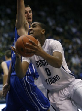(RNS1-MAR03) BYU starter Brandon Davies, right, was suspended from the school's top-ranked team heading into March Madness for violating the school's honor code that prohibits pre-marital sex. For use with RNS-BYU-SUSPEND, transmitted March 3, 2011. RNS photo by Francisco Kjolseth / The Salt Lake Tribune. 