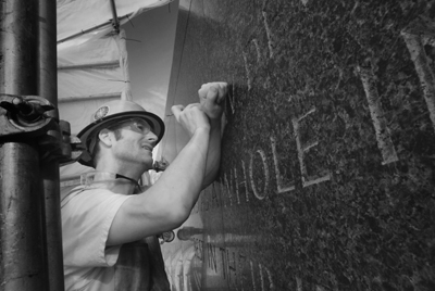 (RNS3-AUG18) Third-generation stone carver Nicholas Benson of Newport, R.I., engraves more than a dozen quotations from the Rev. Martin Luther King Jr. into the memorial that will honor the slain civil rights leader. For use with RNS-KING-MINISTER, transmitted Aug. 18, 2011. RNS photo courtesy Johnny Bivera. 
