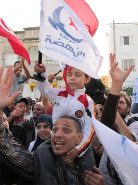 (RNS1-NOV28) Supporters of the moderate Islamist Ennahda party rally in Tunisia as the North African country makes its way toward a tentative democracy as the first country in the Arab Spring movement. For use with RNS-TUNISIA-MUSLIMS, transmitted Nov. 28, 2011. RNS photo by Elizabeth Bryant. 