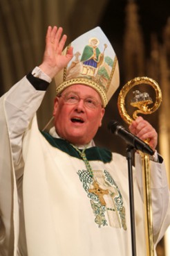 (RNS1-NOV16) New York Archbishop Timothy M. Dolan, president of the U.S. Conference of Catholic Bishops, shown here blessing the assembly at the end of a St. Patrick's Day Mass at St. Patrick's Cathedral in New York City, will be promoted to the College of Cardinals, the Vatican announced on Friday. RNS file photo by Gregory A. Shemitz. 