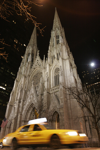 A taxi passes by St. Patrick's Cathedral in New York. RNS photo by Gregory A. Shemitz