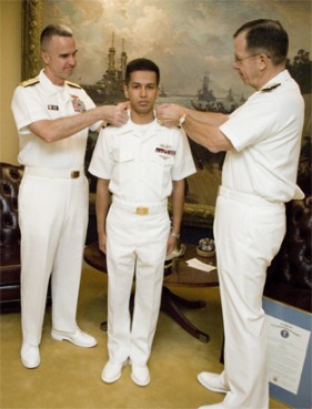 Then-Chief of Naval Operations Adm. Mike Mullen, right, and Rear Adm. Alan Baker, Deputy Chief of Navy Chaplains, left, commission Ensign Asif Balbale in 2007 into the Chaplain Corps as the third Muslim chaplain in the U.S. Navy.   