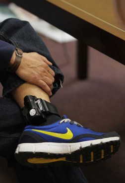 Saul Timisela, 45, who has taken refuge from deportation at the Reformed Church of Highland Park, is interviewed while wearing a ankle bracelet at the church on Thursday, March 15, 2012. Timisela is an Indonesian Christian who fears religious persecution if deported back to Indonesia, one of the world's largest Islamic countries. 