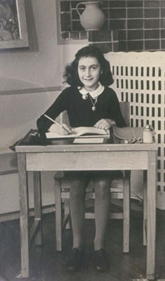 Anne Frank, photographed at school before her family went into hiding from the Nazis in 1942. Photo courtesy of the Netherlands Institute for War Documentation