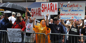 Anti-Shariah demonstrators rally against a proposed mosque near Ground Zero in New York.   