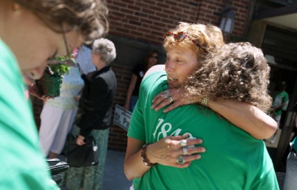 Patricia Schulte-Singelton, a parishioner at St. Patrick Church in Cleveland, hugs another parishioner after leaving the church for the final time after the closing Mass on May 30, 2010. The Vatican recently overruled the decision to close St. Patrick and more than a dozen parishes in the Diocese of Cleveland. 