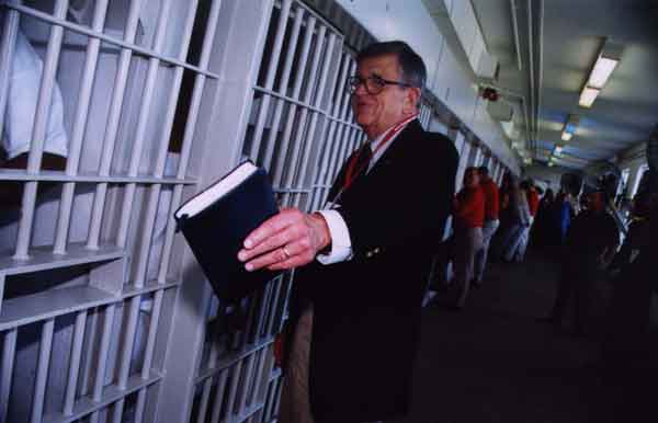 Prison Fellowship founder and Watergate figure Chuck Colson visits a prison. Photo courtesy of Prison Fellowship