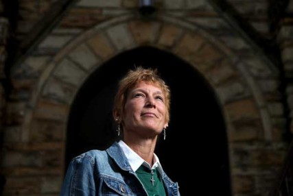 Patricia Schulte-Singleton, 53, never gave up the fight to save her church, St. Patrick, in Cleveland's West Park. Schulte-Singleton has been a parishioner at St. Patrick since 1990. St. Patrick is one of the 12 churches Bishop Lennon ordered closed and is now reopening. Schulte-Singleton, president of a group called Endangered Catholics, was at the vanguard of a grassroots fight to reopen the churches. She organized protests, prayer vigils and appeals to Rome, working tirelessly to save St. Pat's and other churches. The church was built in 1896. Date shot: Thursday, April 19, 2012. 