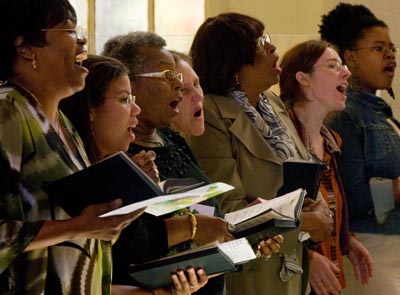 Members of the First Grace United Methodist Church choir sing praises on a 
Sunday morning. The church is a post-Katrina merger of the predominantly white First Methodist 
Church and mostly black Grace United Methodist Church. 