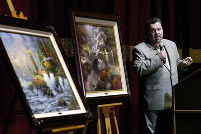 Painter Thomas Kinkade talks with a group of fans at the Whitaker Center for the 
Science and the Arts in Harrisburg, Pa., on Feb. 7, 2004.  