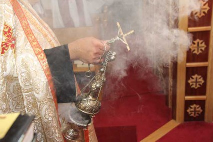 Incense is wafted though St. Mary & St. Verena Coptic Orthodox Church in Anaheim, Calif. during a service. 