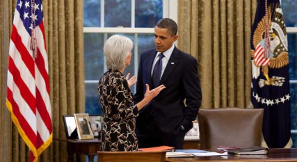 President Barack Obama talks with Health and Human Services Secretary Kathleen Sebelius, whose department is charged with implementing new rules that mandate employers to provide contraception coverage to employees. 