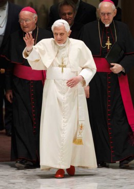 Pope Benedict XVI waves as he arrives to lead his general audience in Paul VI hall at the Vatican Feb. 8. 