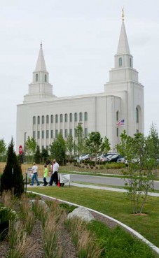 An American flag flies in front of the Kansas City, Missouri Mormon temple as visitors are welcomed during their open house on April 28, 2012 before being formally dedicated on Sunday, May 6. The temple serves some 45,000 Latter-day Saints in 126 congregations throughout Kansas, Missouri and small portions of Oklahoma and Arkansas. 