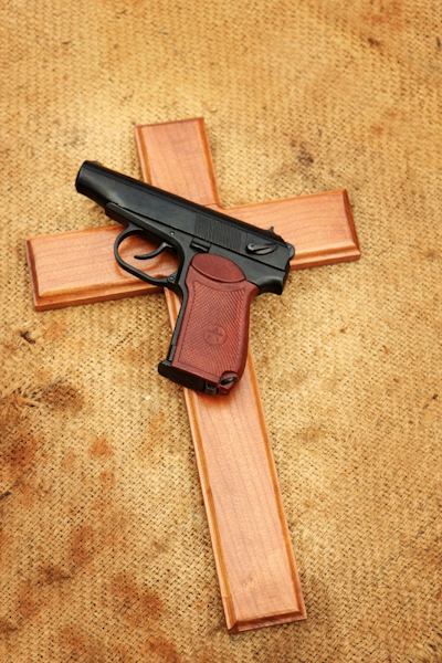Gun and cross