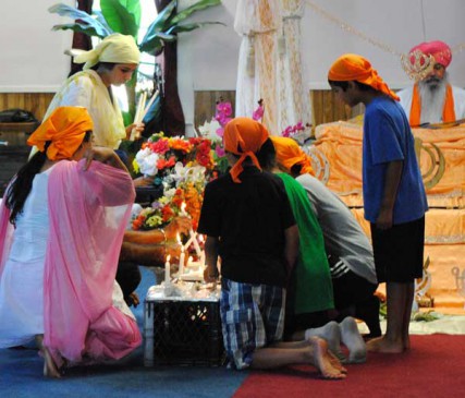 Members of the Spokane, Wa. community light candles to honor those slain at a Wisconsin Sikh temple on Wednesday Aug. 8, 2012. 
