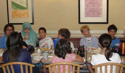 Muslim immigrants frequently worry whether their children will be able to maintain their Islamic identity in a country reputed to be rampant with vice and promiscuity.  The group of kids pictured attend the Islamic Center of Boston in Wayland, Mass. and are having a Ramadan breakfast at the International House of Pancakes.   