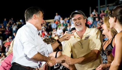Mitt Romney shares a laugh with supporters at a rally in Nashua, NH.  Romney has finally found a religious middle ground, evangelical leaders say, by sidelining Mormon theology and stressing the ?Judeo-Christian values? that he shares with social conservatives.  