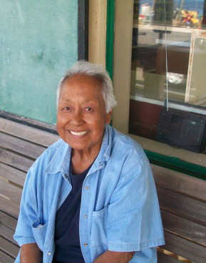 Meli Watanuki is one of Kalaupapa's 17 remaining patients. 8,000 people were sent there over more than 100 years, beginning in 1866. Watanuki, 78, moved to Kalaupapa in 1960. She is sitting in front of the Kalaupapa Store, where she works. 