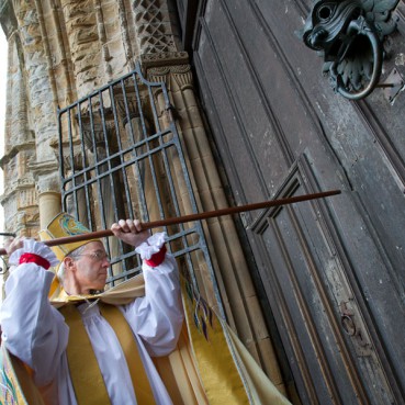 Bishop Justin Welby knocks at the doors of Durham Cathedral during his installation ceremony last year. 