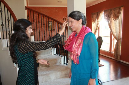 Namita Pallod welcomes Tulsi Gabbard to her father's Houston home for a fundraiser on October 28, 2012. 