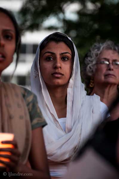 Harleen Dhillon attends a vigil at Cathedral Square Park in Milwaukee on Sunday night Aug. 5 after shooter Wade Michael Page killed 6 people at a local Sikh temple that morning.  RNS photo by Lacy Landre