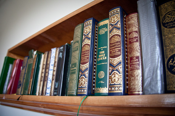 A bookshelf holds several Qurans during 1:30 prayer at the Islamic Society of Greater Kansas City on Tuesday afternoon, June 26, 2012.  RNS photo by Sally Morrow