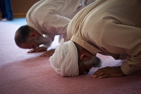 (Far right) Muhhamad Shafiq and Hazem Hassan pray during 1:30 prayer at the Islamic Society of Greater Kansas City on Tuesday afternoon, June 26, 2012.  RNS photo by Sally Morrow