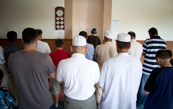 Men pray toward the direction of Kabah in Mecca during 1:30 prayer at the Islamic Society of Greater Kansas City on Tuesday afternoon, June 26, 2012.  RNS photo by Sally Morrow