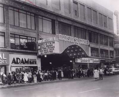 People from all walks of life line up early outside Madison Square Garden for the opening rally of evangelist Billy Graham's New York crusade. 1957 RNS file photo.
