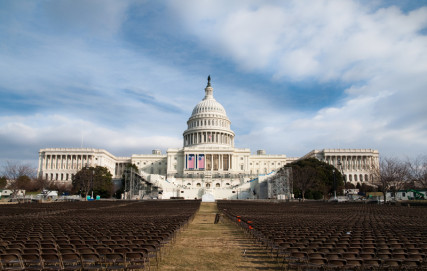 Rows of seats before the U.S. Capitol building.