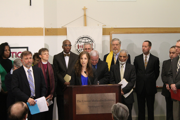Rachel Laser speaks at a Capitol Hill press conference with more than 45 clergy and heads of religious groups.  The group petitioned lawmakers to reinstitute a ban on assault weapons, require background checks on all gun buyers, and make gun trafficking a federal crime. RNS photo courtesy Religious Action Center of Reform Judaism.  
 