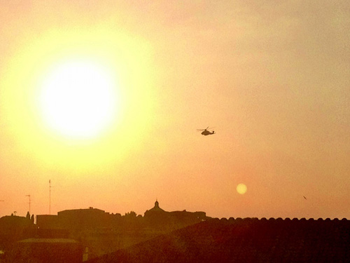 An Italian helicopter carrying Pope Benedict XVI departs the Vatican on Friday as Benedict became the first pope in 600 years to voluntarily leave office.  RNS photo by Alessandro Speciale