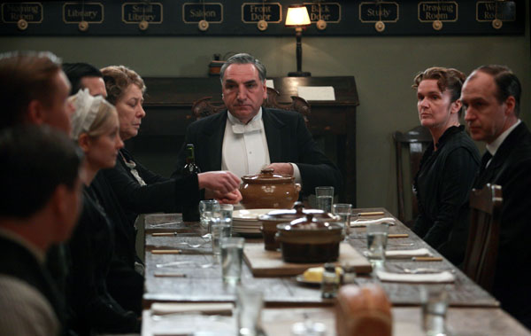 In the Servants' Hall with Joanne Froggatt as Anna, Rob James-Collier as Thomas, Phyllis Logan as Mrs Hughes, Jim Carter as Carson, Siobhan Finneran as Sarah O’Brien, Kevin Doyle as Molesley.  RNS photo courtesy of © Carnival Film & Television Limited 2012 for MASTERPIECE.
