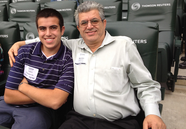 A disgruntled former employee murdered Sami Rahamim’s father, Reuven, (both pictured here) last September. But the teen doesn't want to be known for what happened to him. Instead, he wants to be recognized for what he is doing about it. RNS photo courtesy Sami Rahamim
