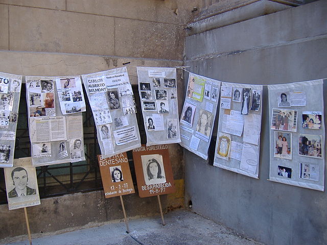 Pictures and newspaper clips of desaparecidos (victims of forced disappearance) in a former illegal detention center in Rosario, Argentina. Photo by Pablo D. Flores / courtesy Wikimedia Commons (http://bit.ly/10TLahA)